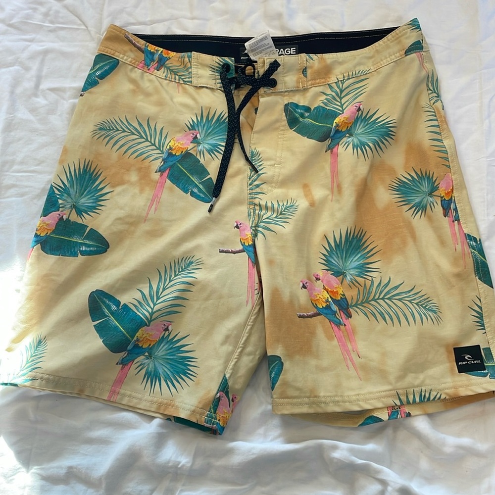Rip curl mirage board shorts. Yellow color way with flowers